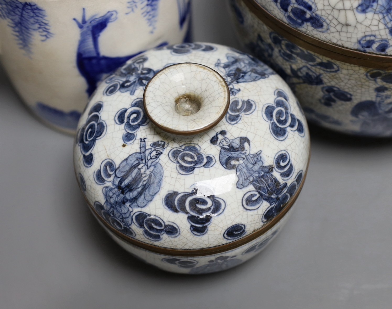 Three Chinese blue and white jars and a teapot, tallest 19cm